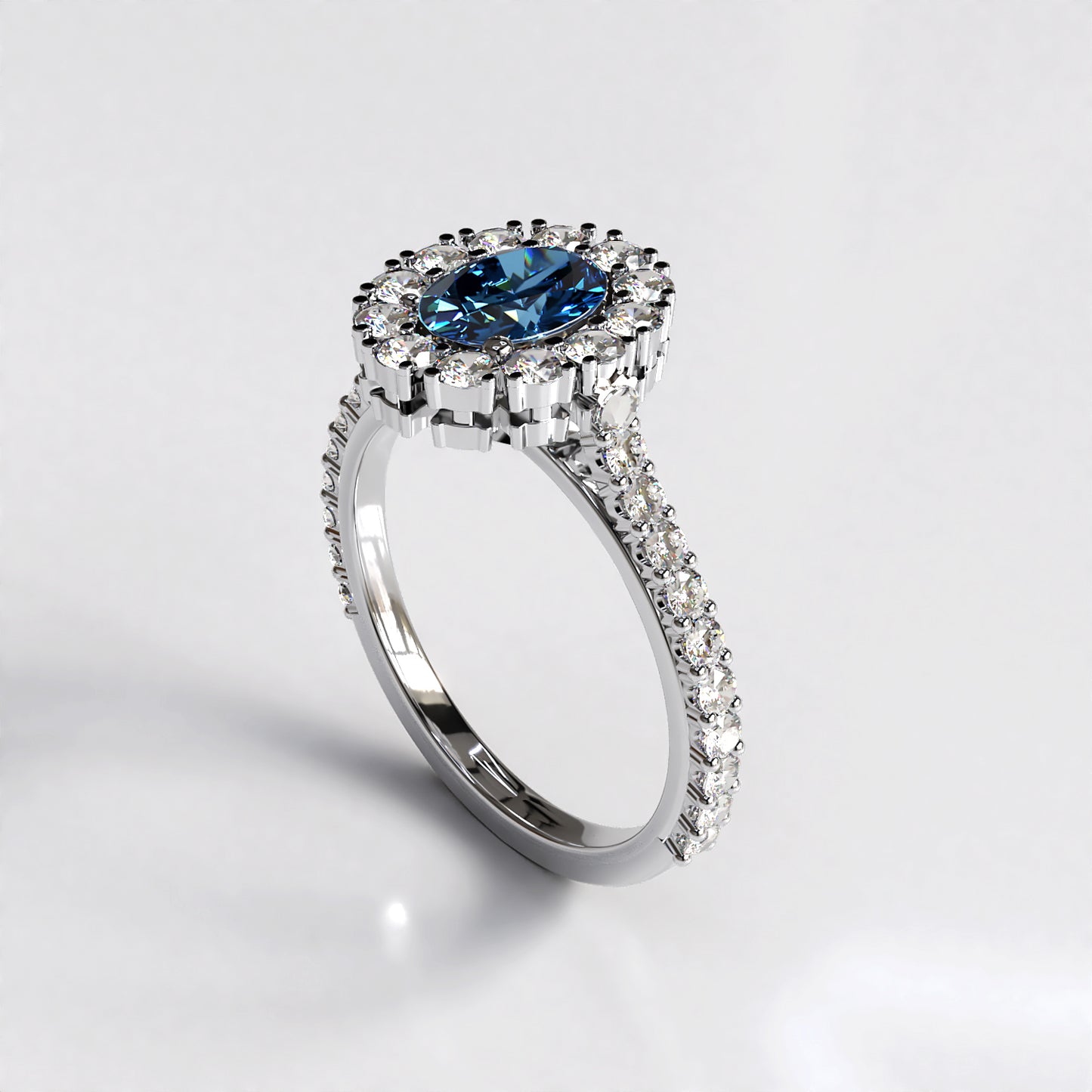 Vintage Halo: Platinum Engagement Ring with 1ct Sapphire Centre Stone and Diamond Halo