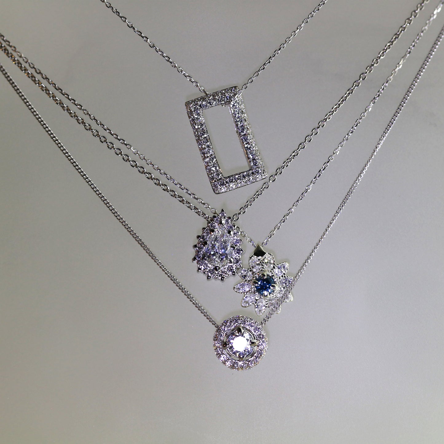 Etiquette: 18ct White Gold Diamond Pendant. - Neil Rayment Goldsmiths