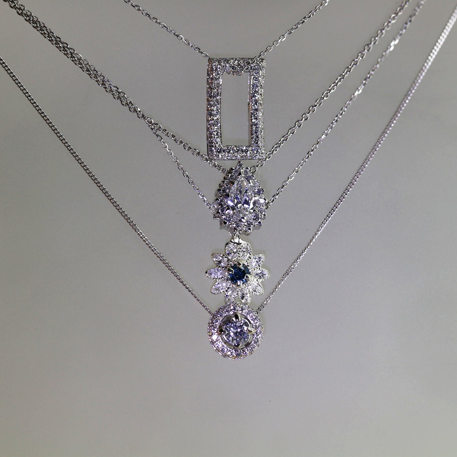 Etiquette: 18ct White Gold Diamond Pendant. - Neil Rayment Goldsmiths