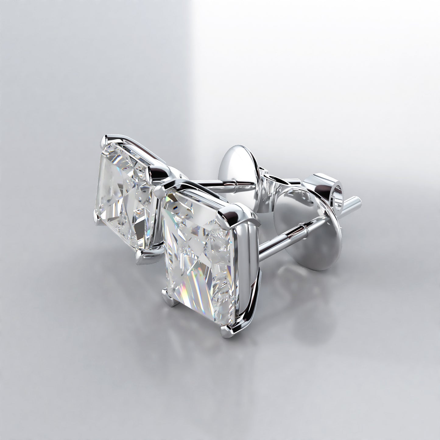 Prime: Platinum Emerald Cut Diamond Stud Earrings