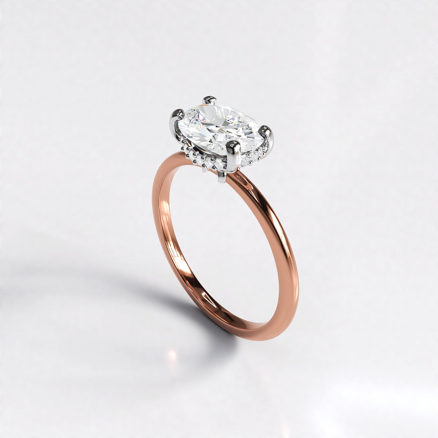 Delicate Poise: 18ct Yellow gold oval-cut diamond engagement ring with Platinum head