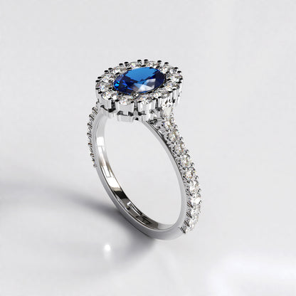 Vintage Halo: Platinum Engagement Ring with 1ct Sapphire Centre Stone and Diamond Halo