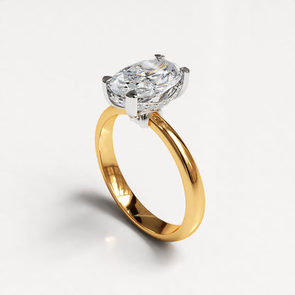 Delicate Serenity: 18ct Yellow gold oval-cut diamond engagement ring with Platinum head