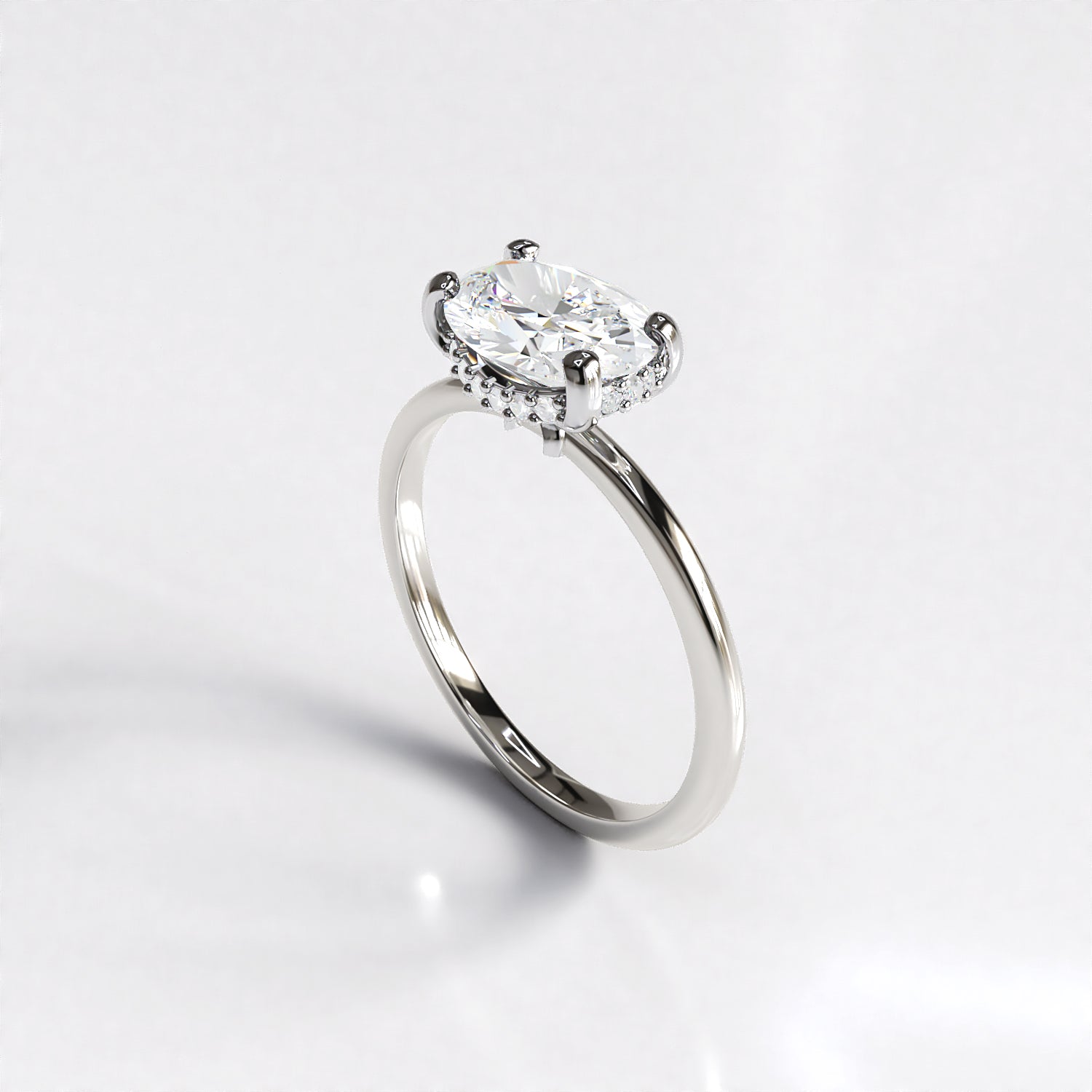 Delicate Poise: 18ct Yellow gold oval-cut diamond engagement ring with Platinum head - Neil Rayment Goldsmiths