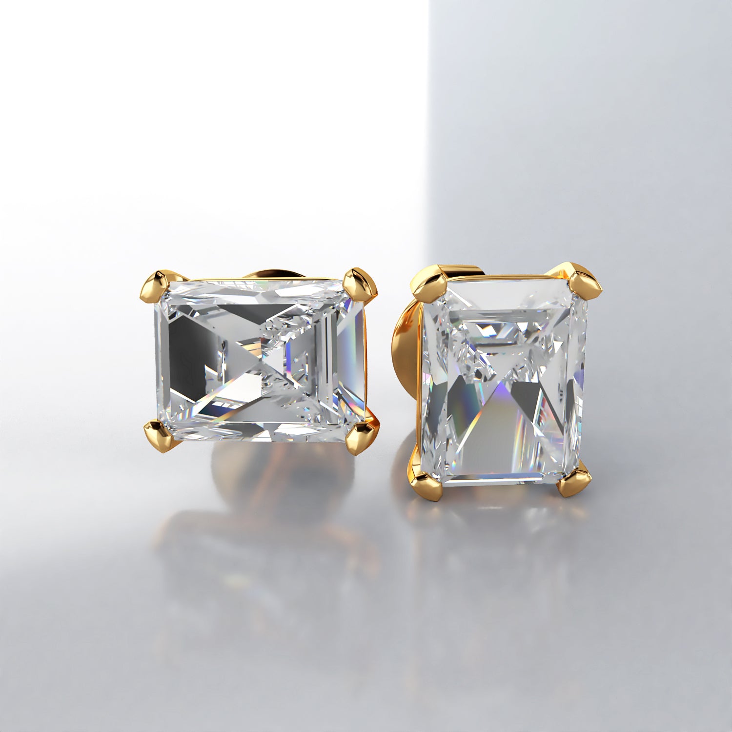 Emerald cut diamond sales earrings platinum