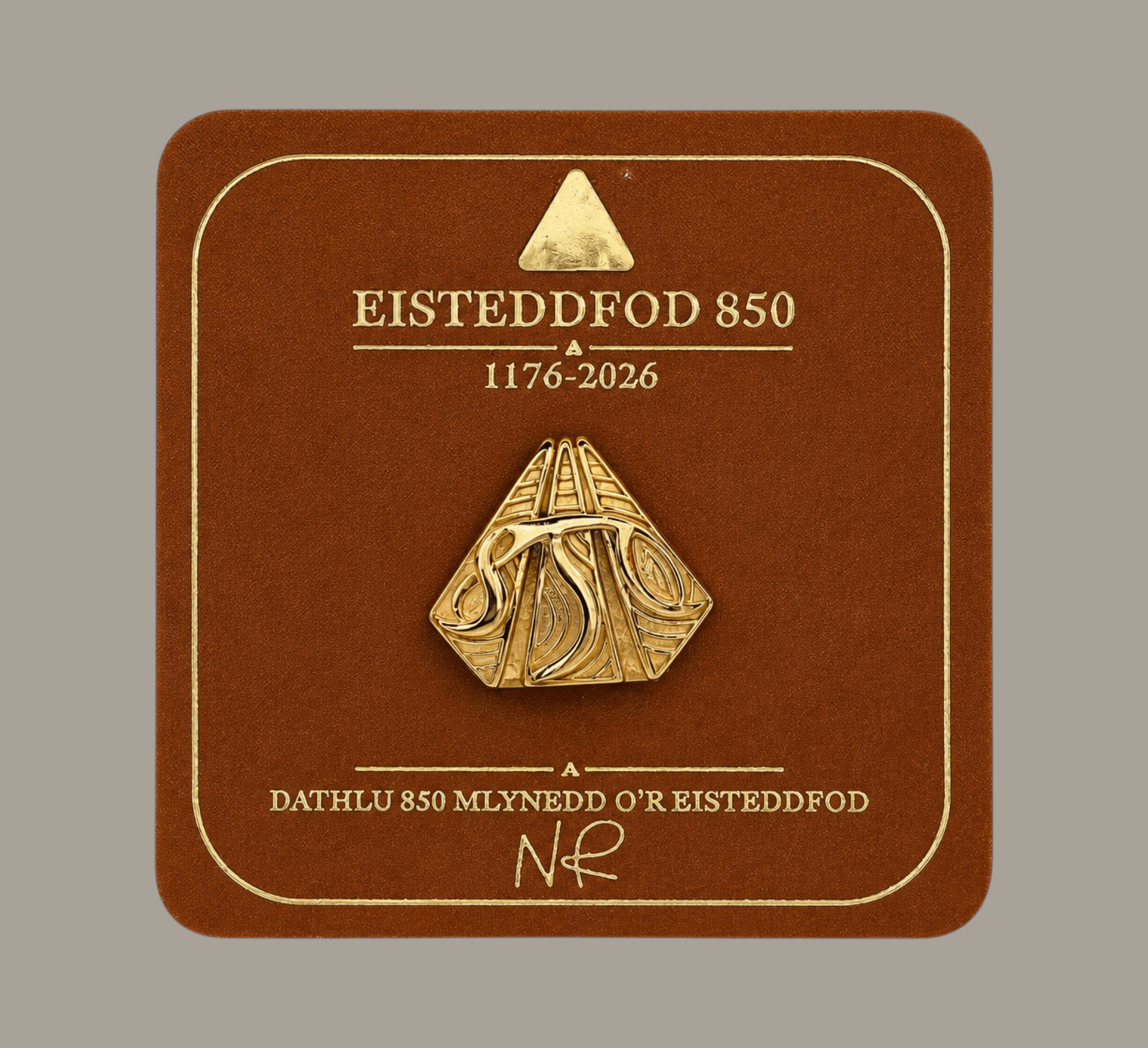Brass Eisteddfod 850 lapel pin on commemorative Welsh heritage backing card