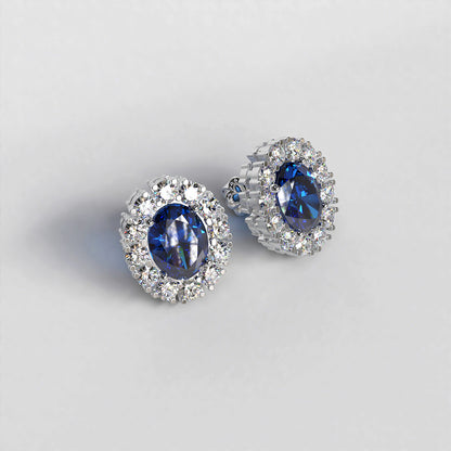 Vintage Halo: Platinum Stud Earring with 0.5ct Sapphire Centre Stone and Diamond Halo